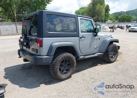 2015 Jeep Wrangler Willys Wheeler z USA, uszkodzony, nr VIN 1C4AJWAG2FL507778